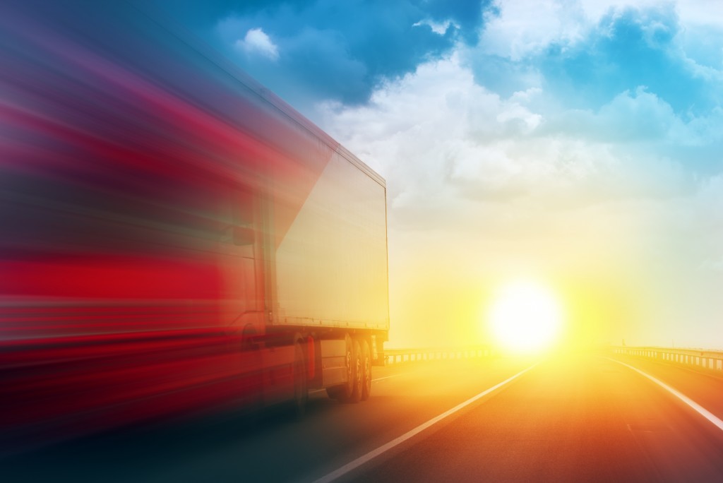 Speeding Transportation Delivery Truck on Open Highway