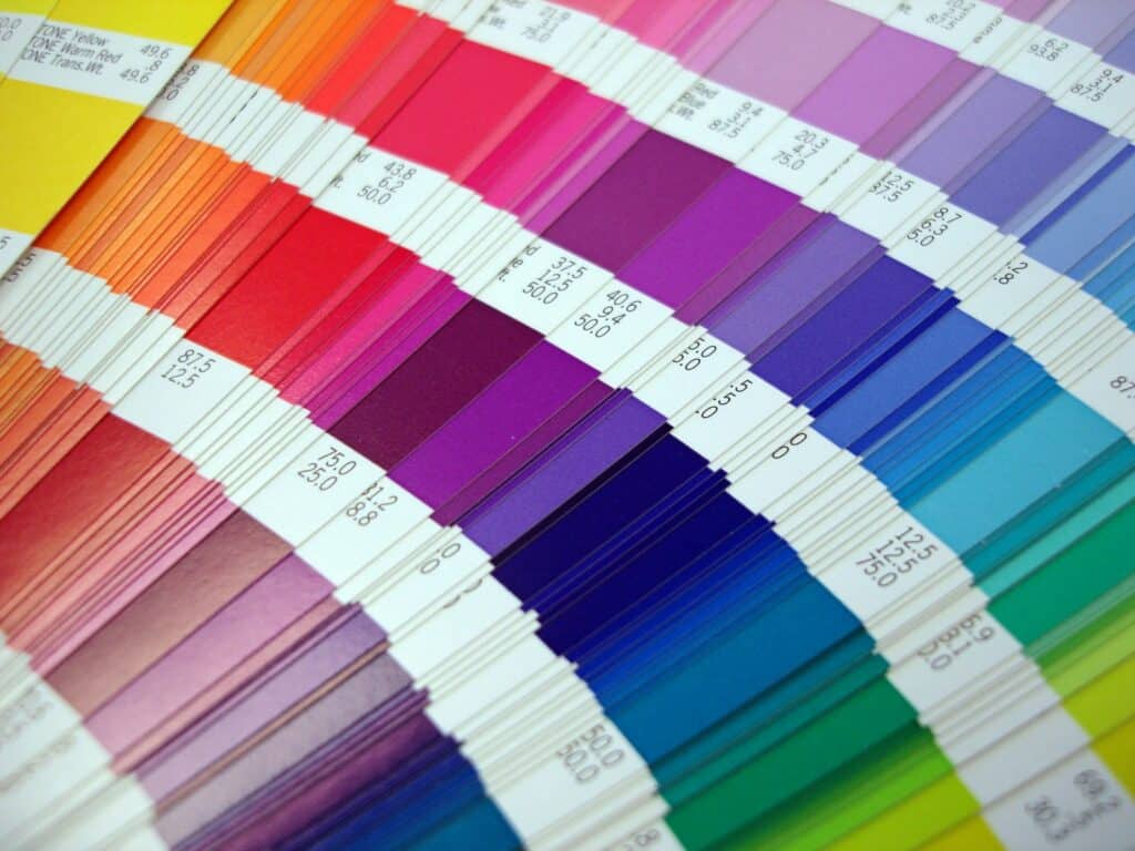 A variety of Pantone color cards fanned out